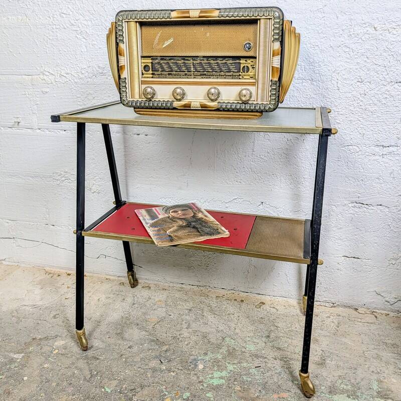Vintage 1950s rolling dessert trolley with two shelves.