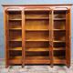 Empire library in cherry tree with blonde patina and gilded bronze around 1950