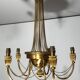Neoclassical style brass chandelier decorated with pearl garlands