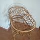 Rattan cradle with its support