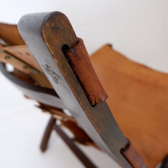 Mid century leather and wood folding armchair, 1950s