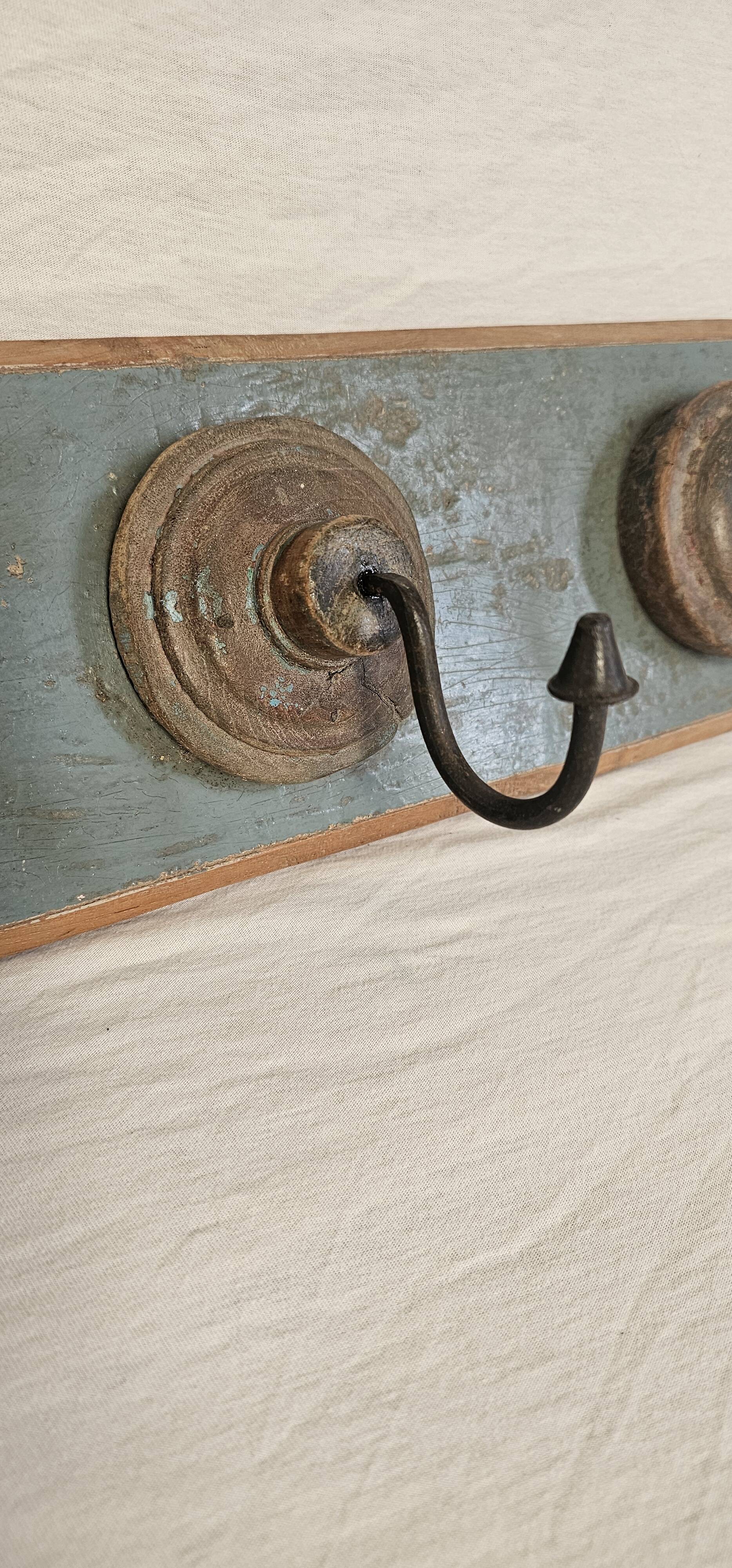 Antique teak coat rack with 3 wrought iron hooks