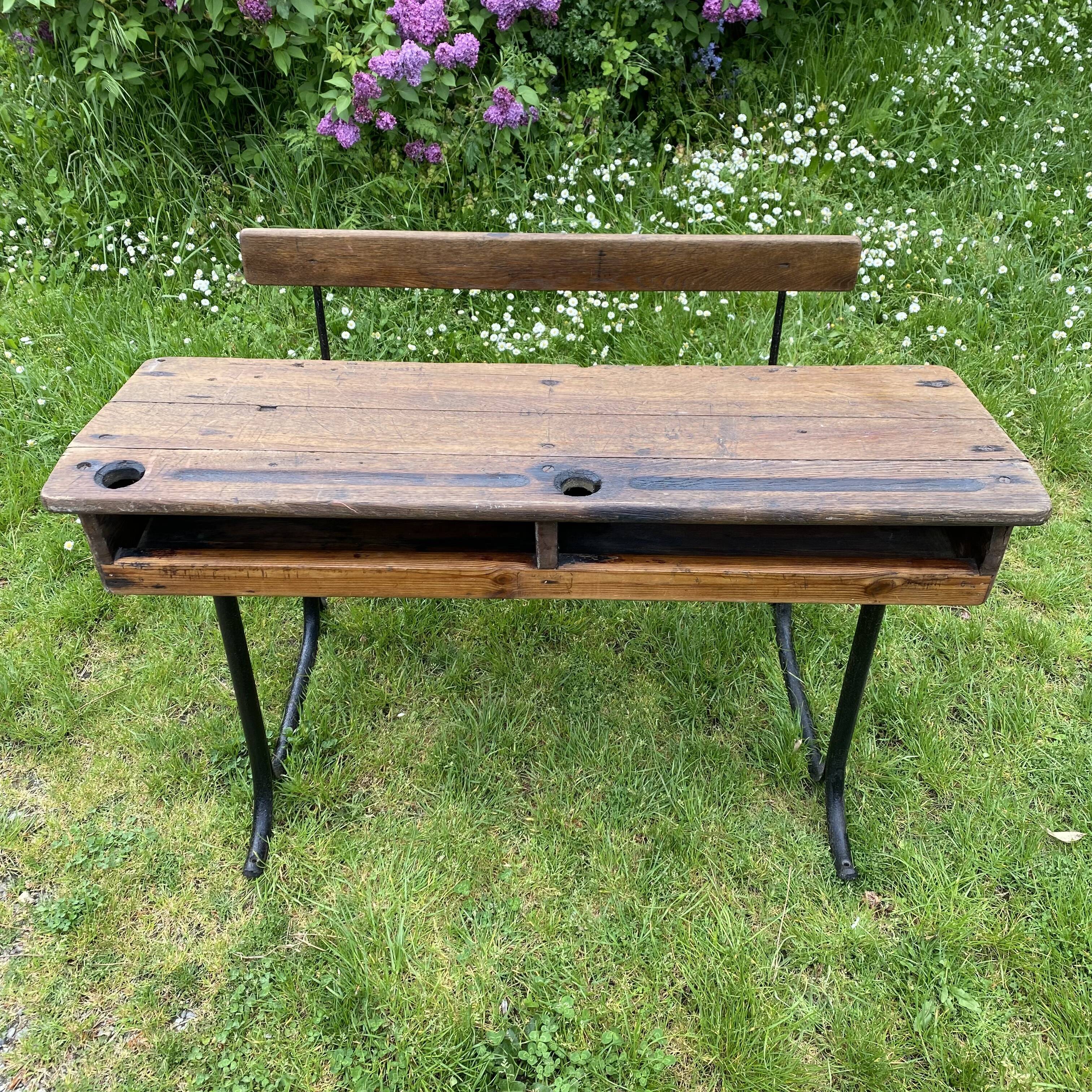 Old school desk in wood and cast iron