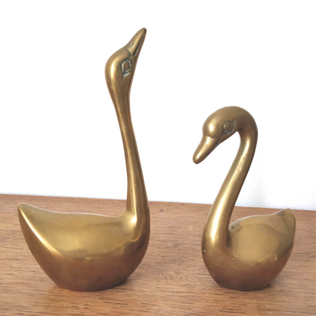 Couple of brass swans