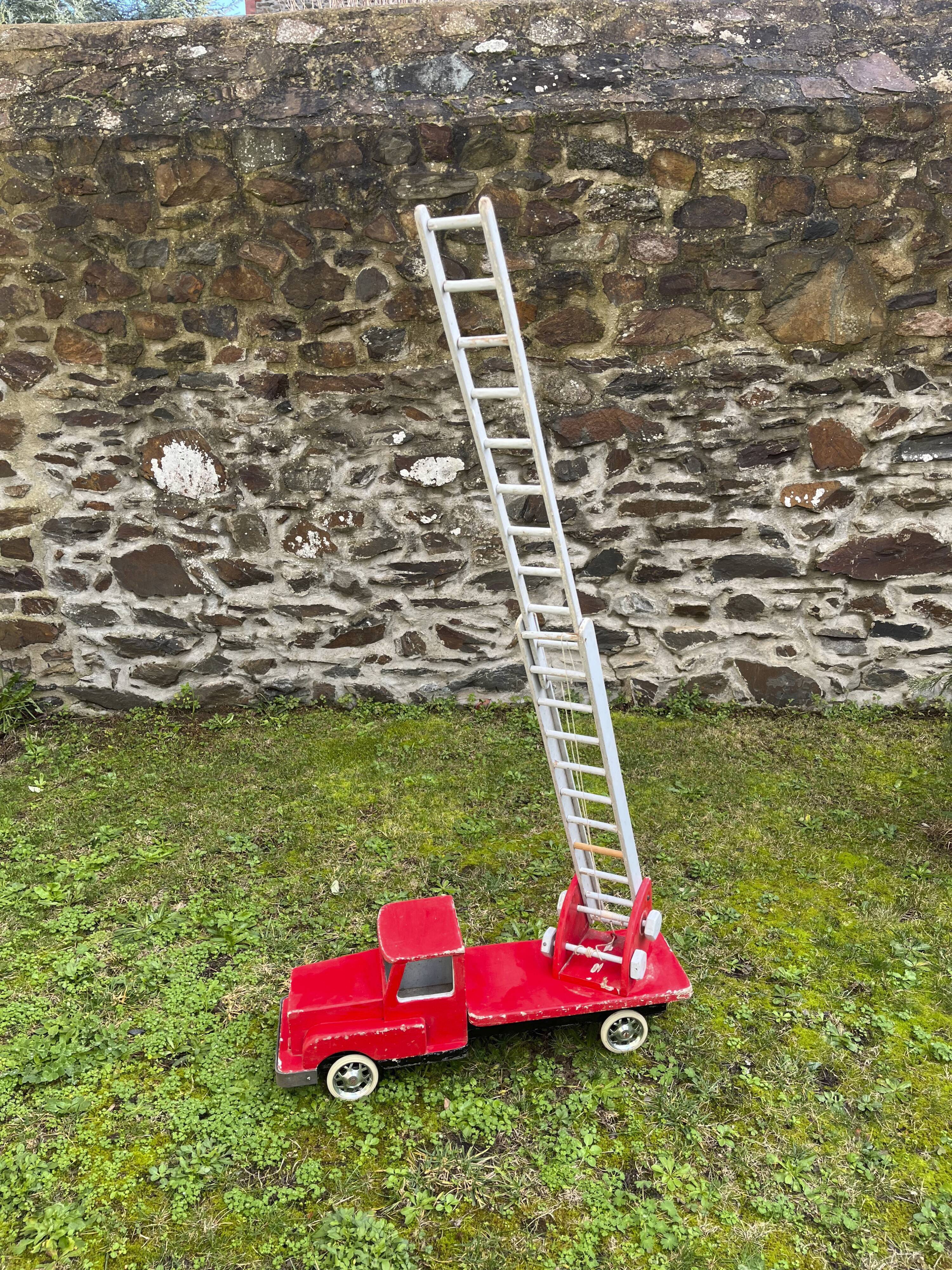 Fire truck with wooden ladder