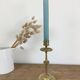 Chiseled brass candle holder