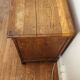 Beautiful old wooden furniture with three drawers.