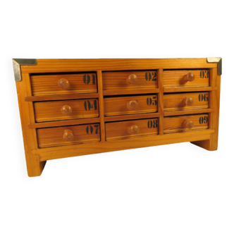Small cabinet with old drawers, watchmaker's layette
