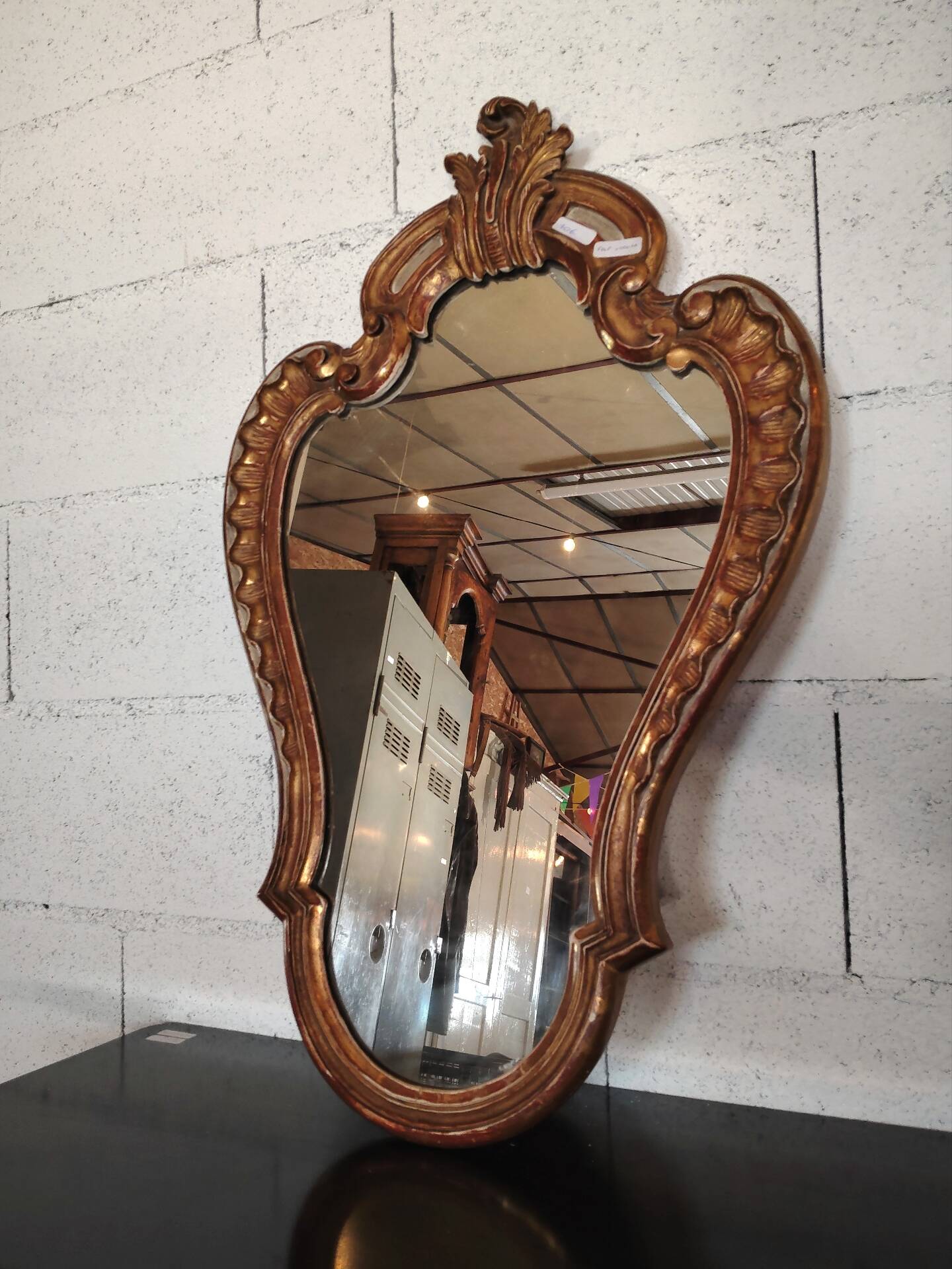 Rococo Style Mirror in Gilded Wood with Sculpted Pediment