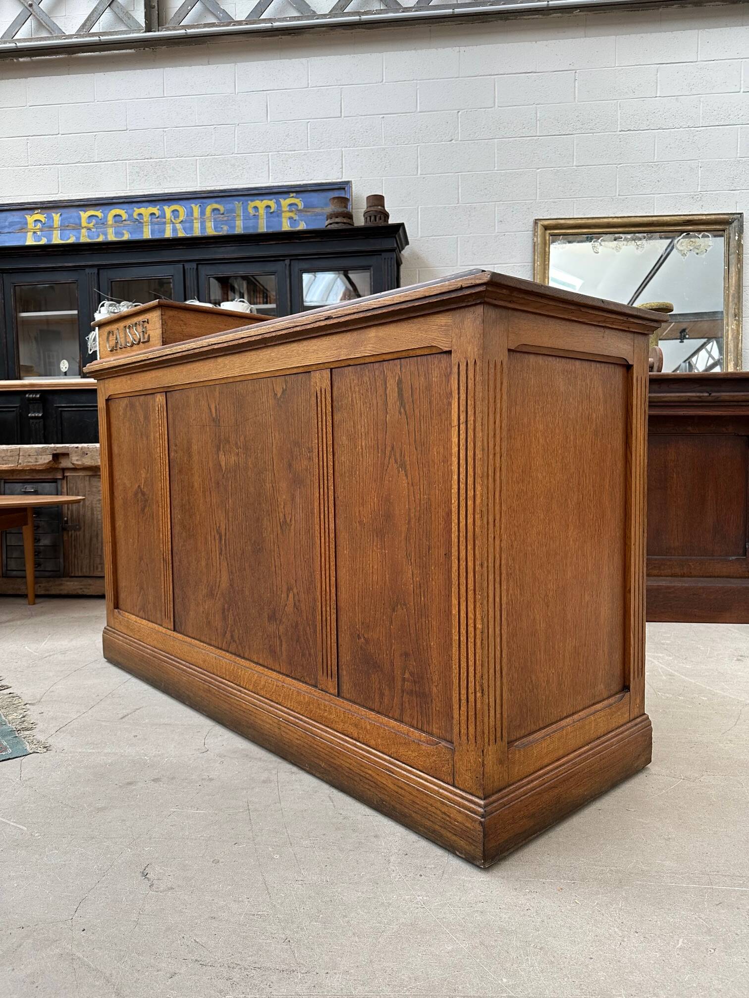 Oak cash register counter from the early 20th century