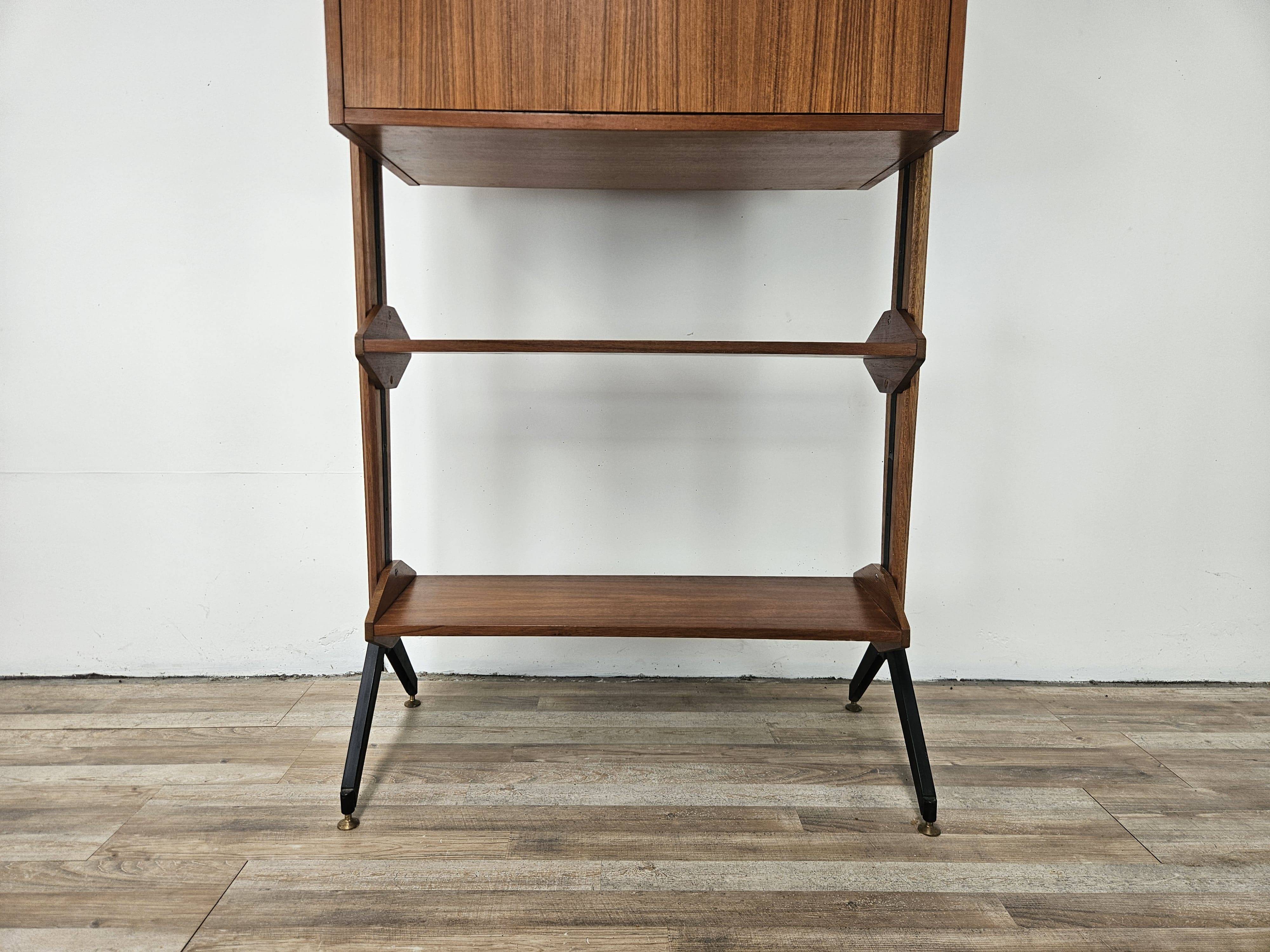 1960s teak floor/sky bookcase with shelves and compartment