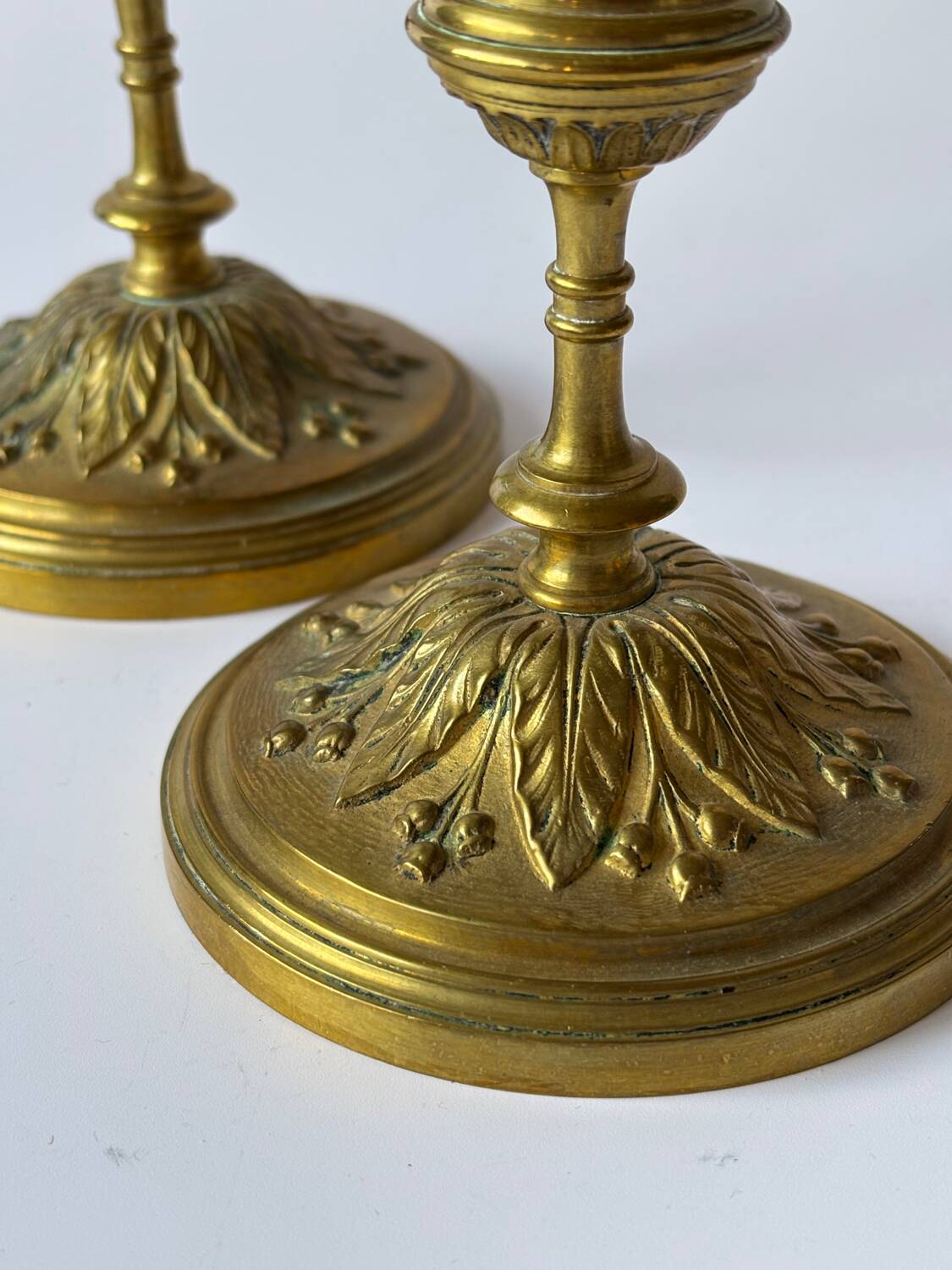 Pair of neoclassical brass candlesticks
