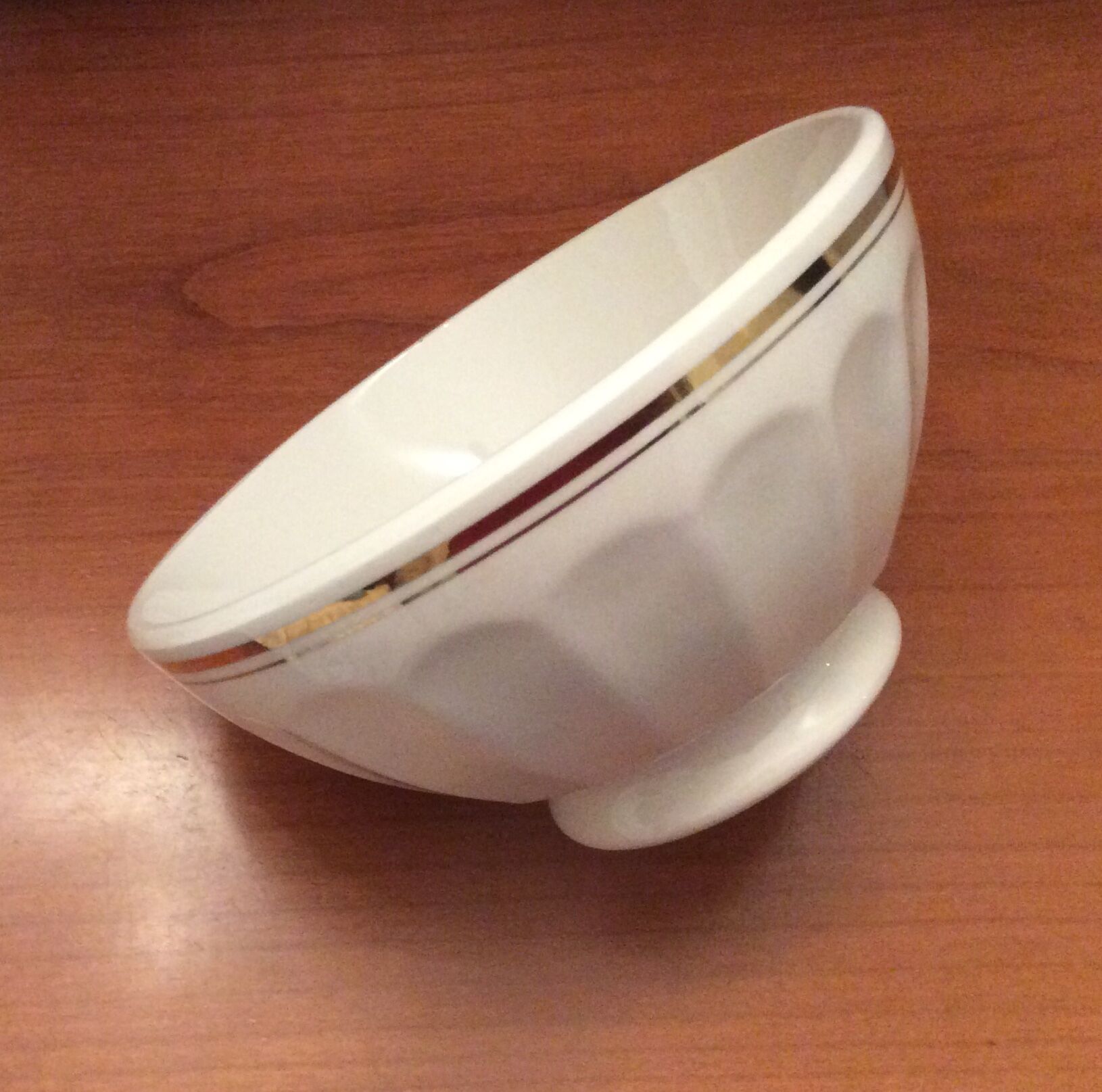 Old white bowl with faceted golden edging - vintage