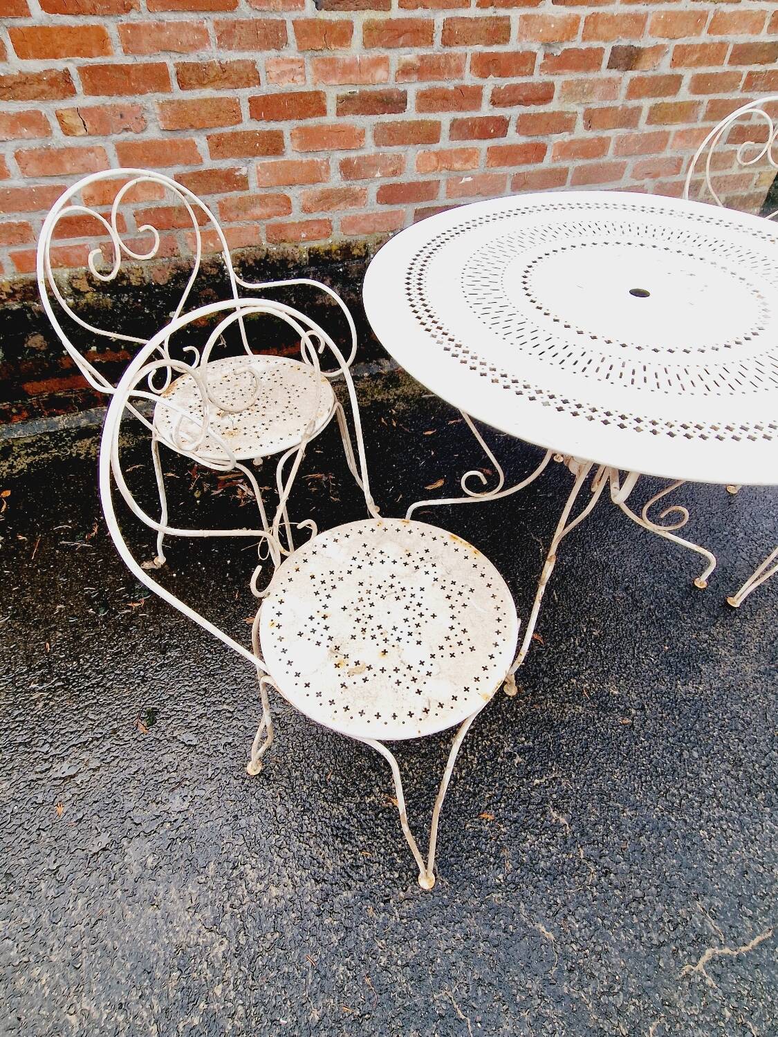 Wrought iron garden furniture chairs and table