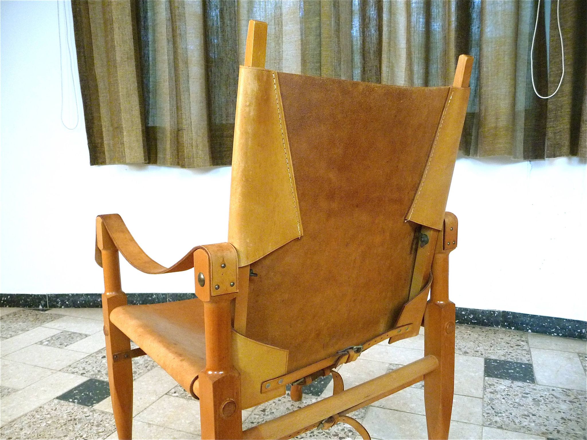 Safari chair in leather by Wilhelm Kienzle for Wohnbedarf, Switzerland 1950