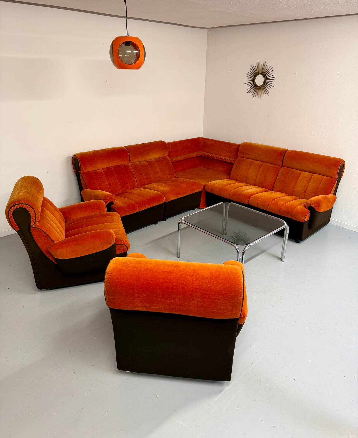 Modular vintage orange corner sofa, 1970s pop design.