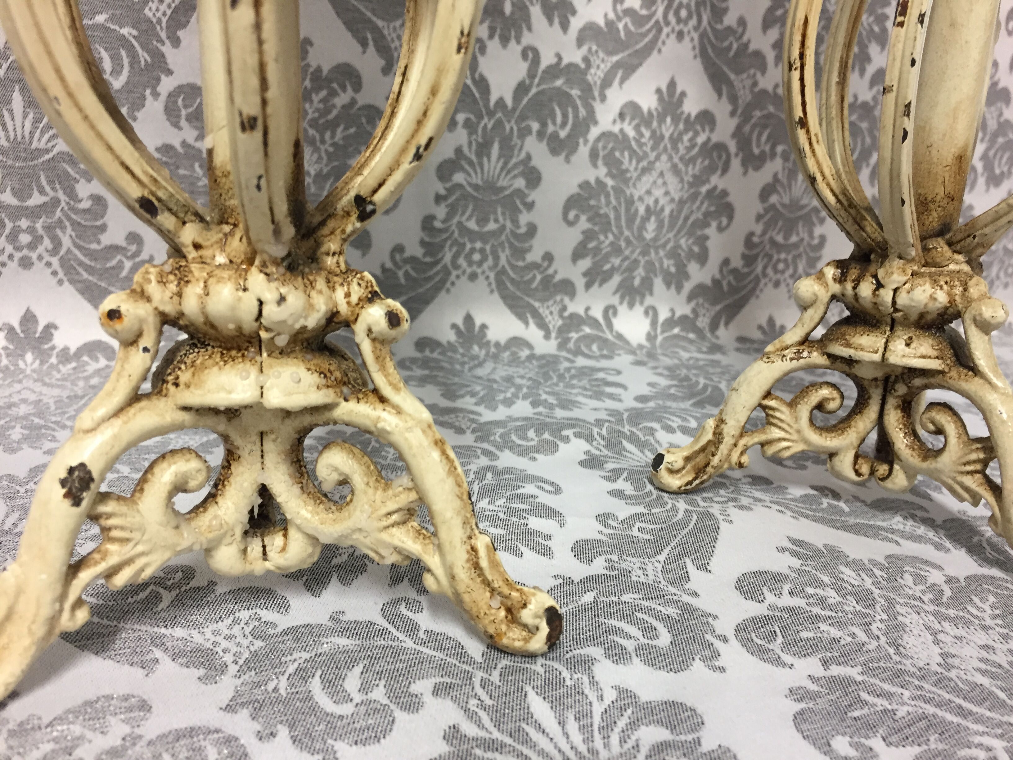 Pair of candlesticks patinated cast iron renaissance design
