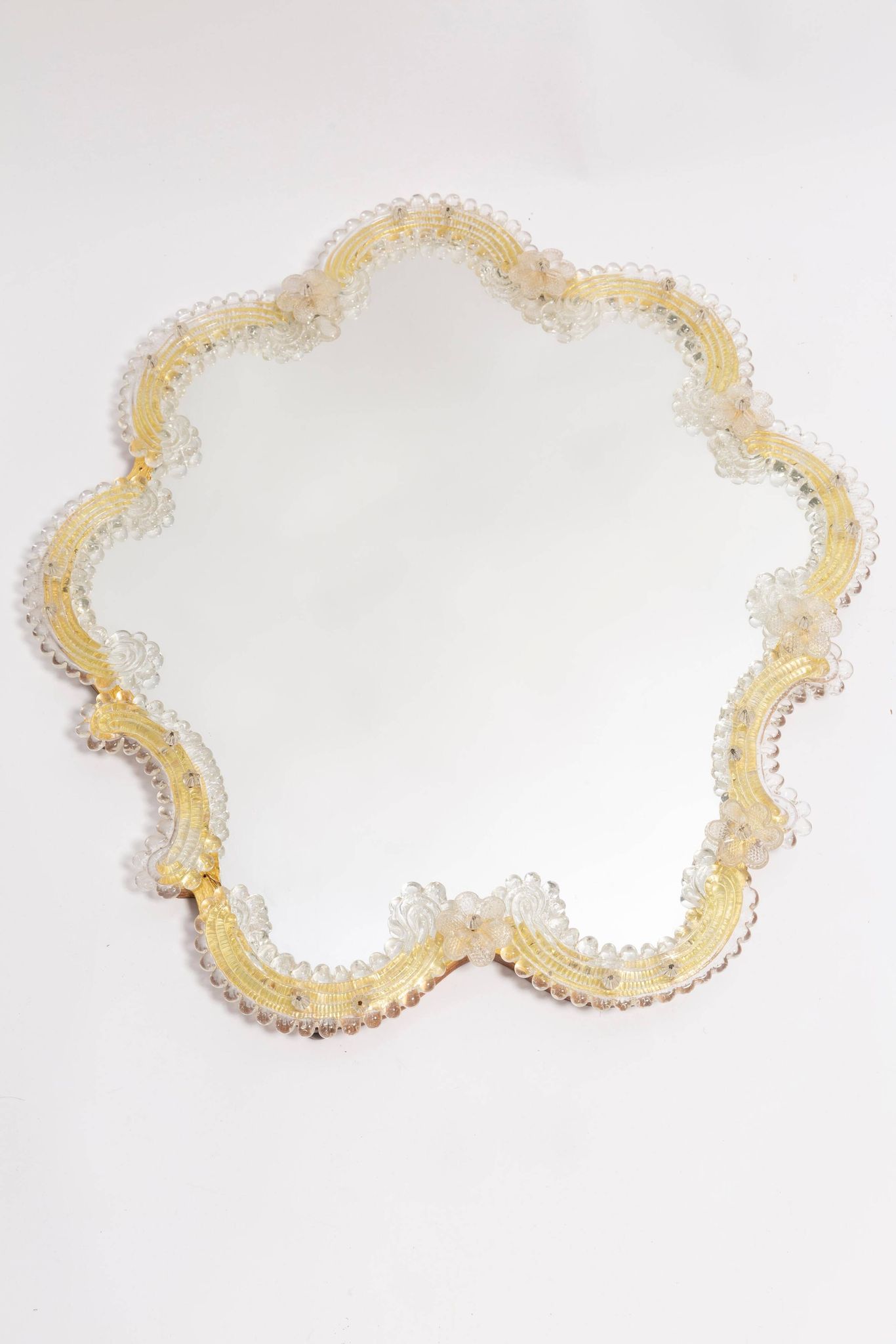 Mid-century decorative mirror in a floral frame, Italy, 1960s.