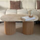 Table basse ovale en travertin et bois cannelé brut