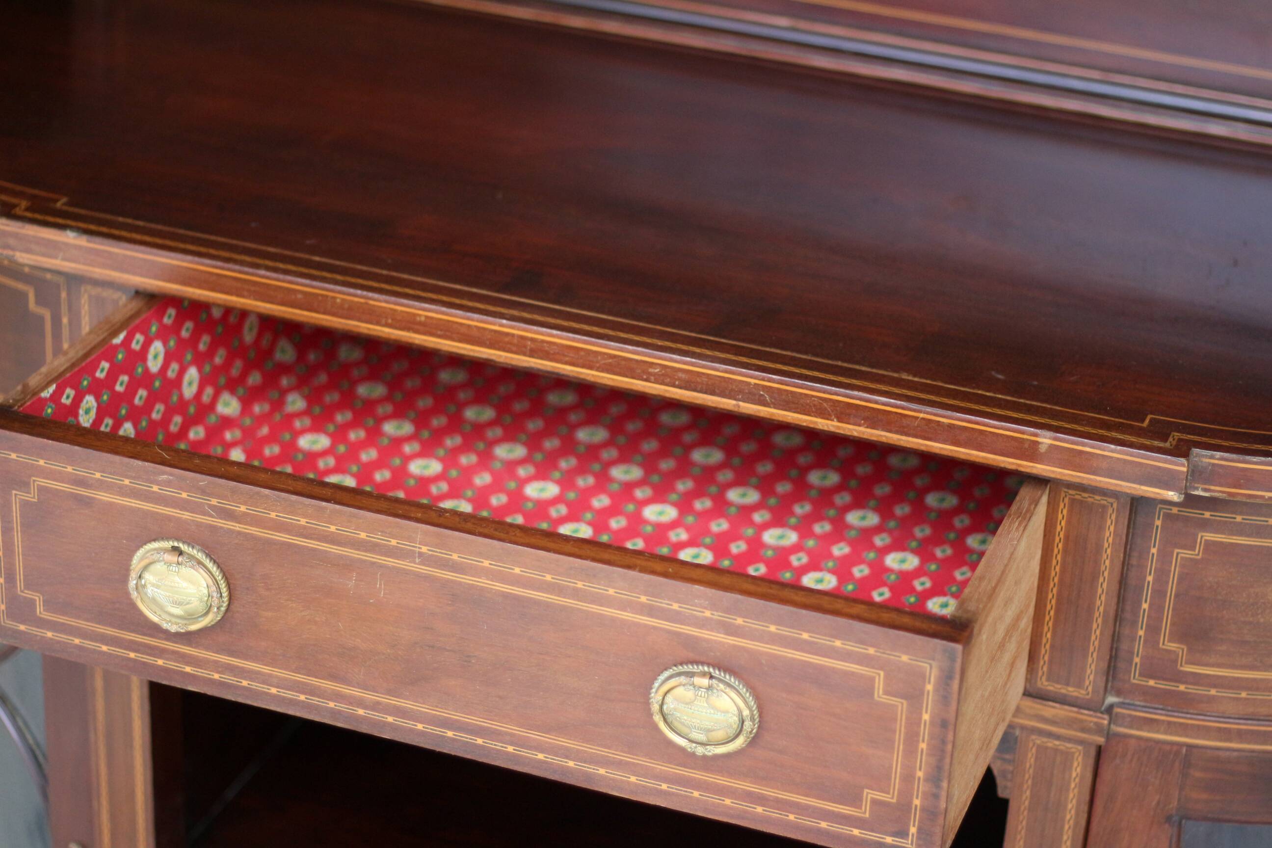 Elegant console by waring & gillow ltd, in mahogany veneer.