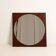 Miroir géométrique en placage de bois de rose