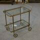 Neoclassical brass and glass serving trolley attributed to Maison Jansen, 1960s