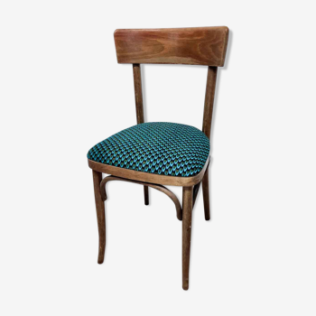 Chaise bistrot vintage revisitée avec une assise en tissu wax