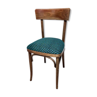 Chaise bistrot vintage revisitée avec une assise en tissu wax