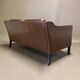Scandinavian design 2-seater leather sofa.
