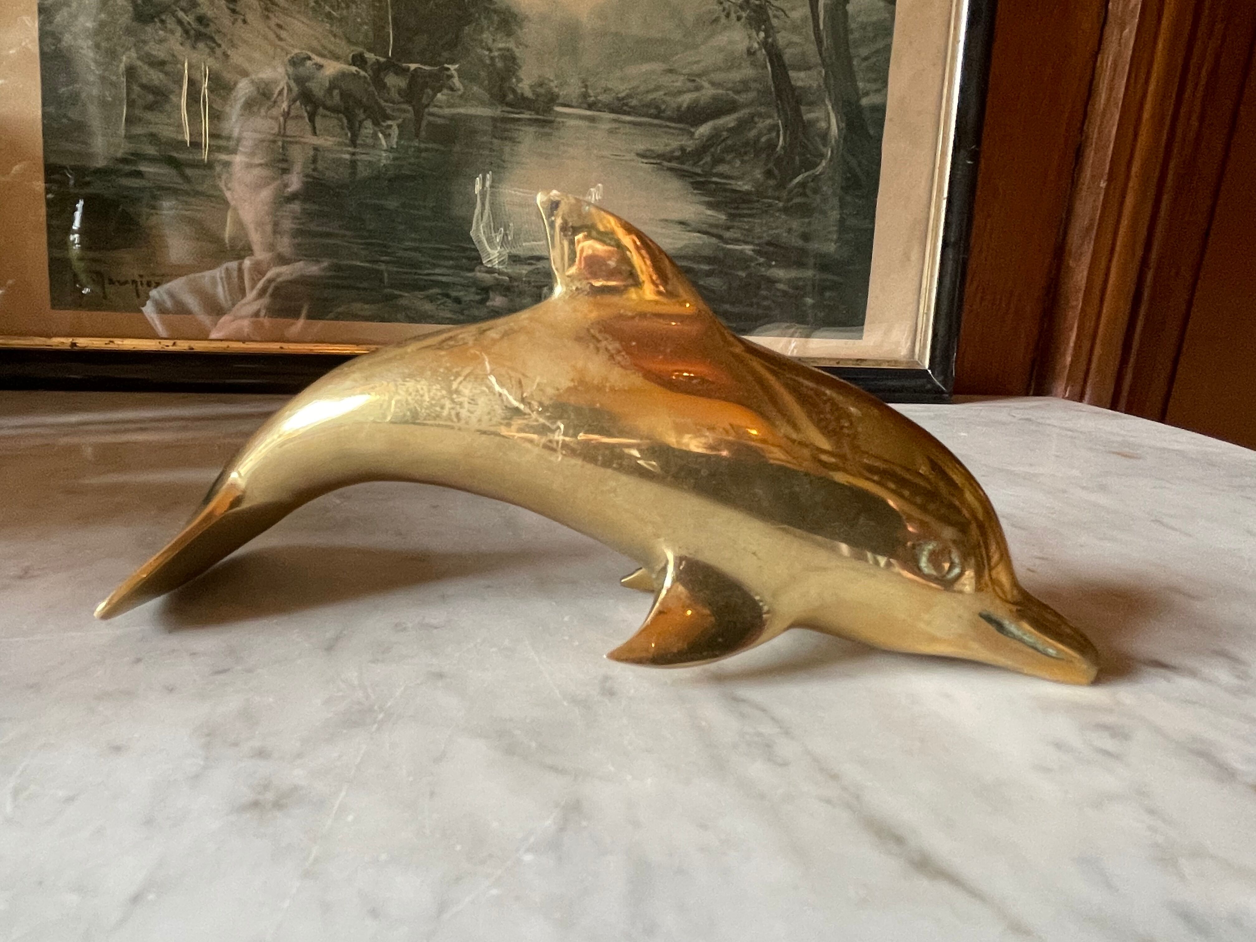 Vintage brass dolphin