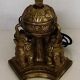 Lampe dorée à pied doré aux trois éléphants