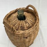 Demijohn type canister covered in wicker