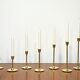Set of 7 Scandinavian brass candle holders, 1960's