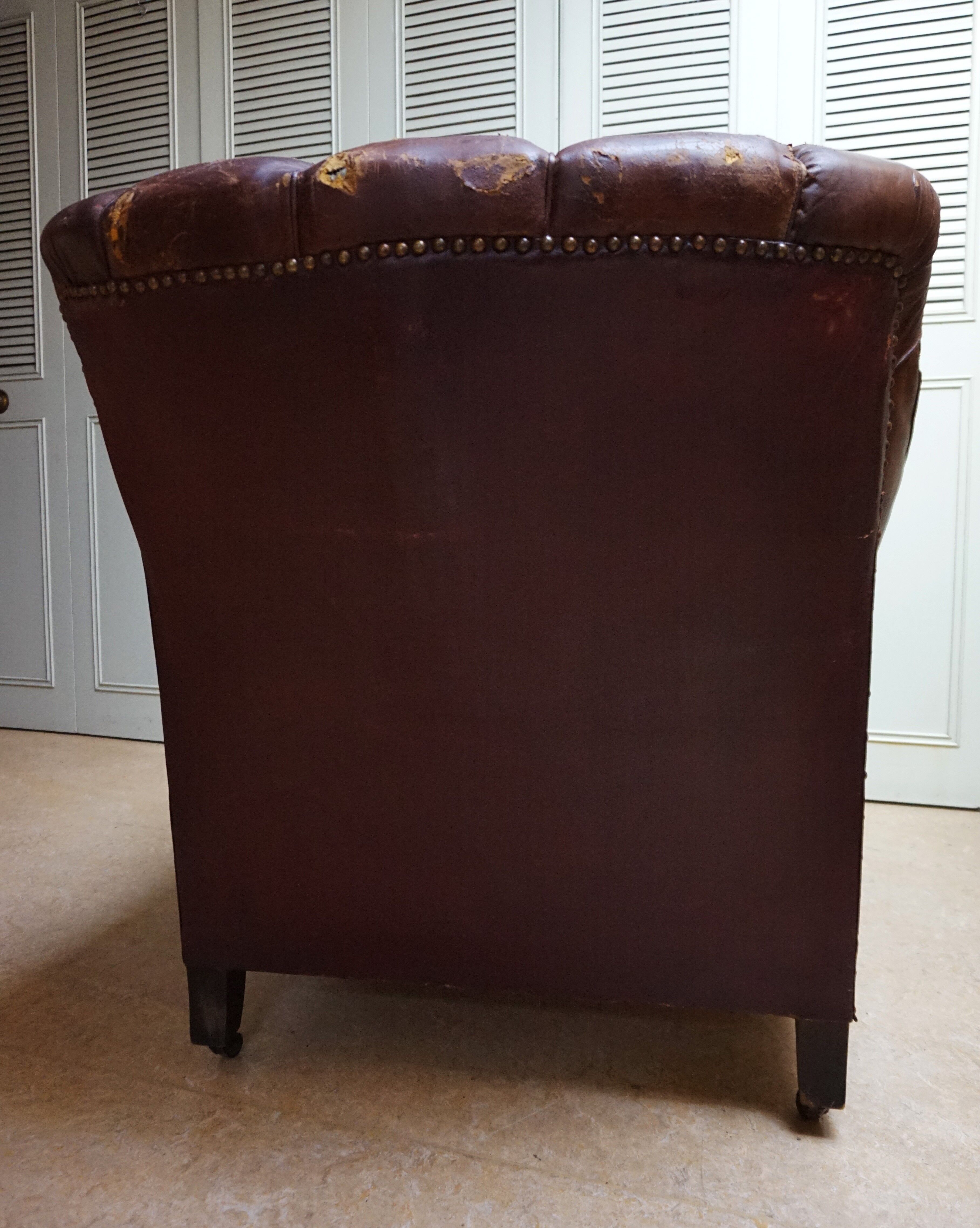 Worn Leather Buttoned Library Fireside Armchair, 1840's