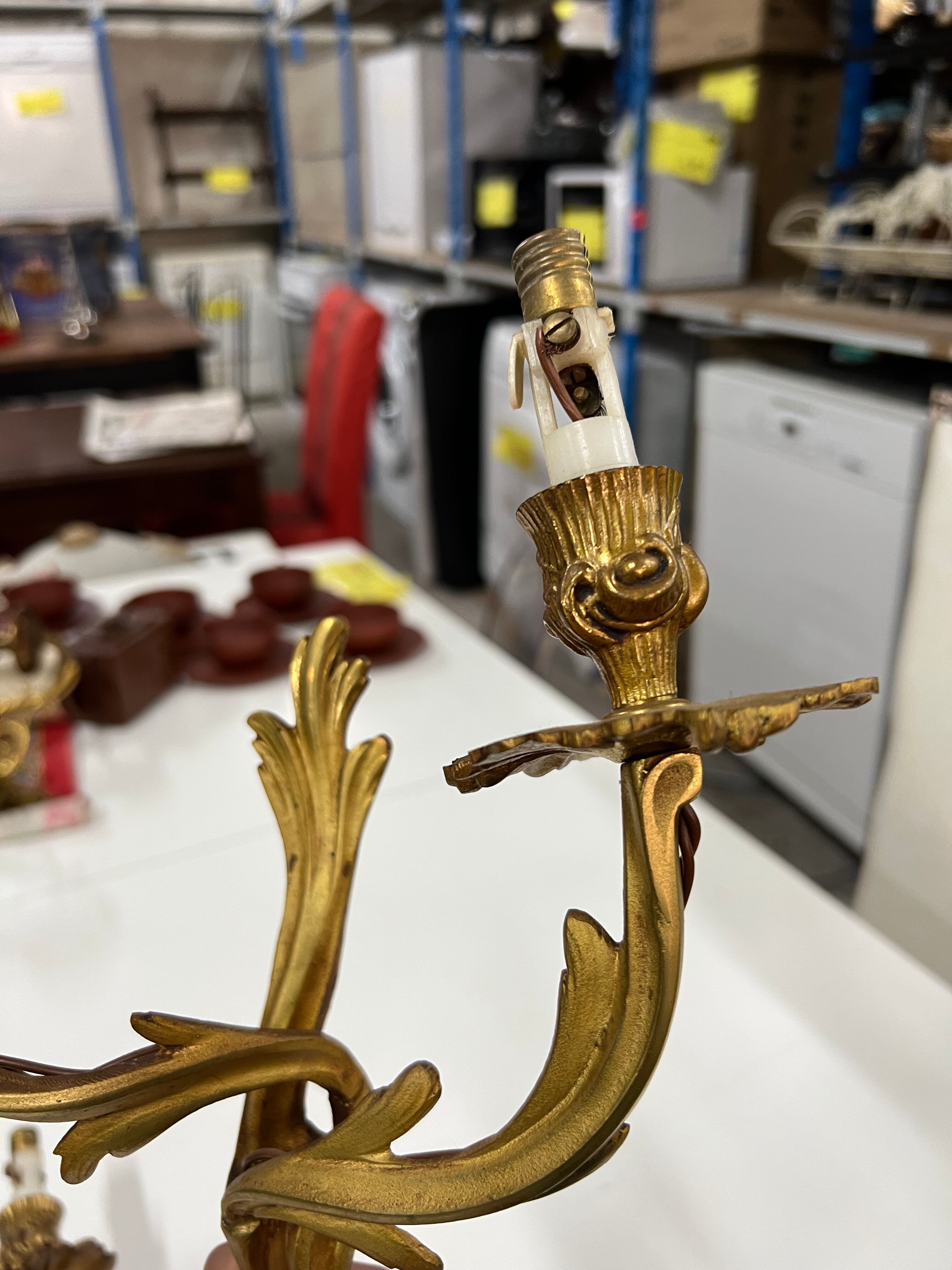 Pair of Louis XV wall lamps in gilded bronze