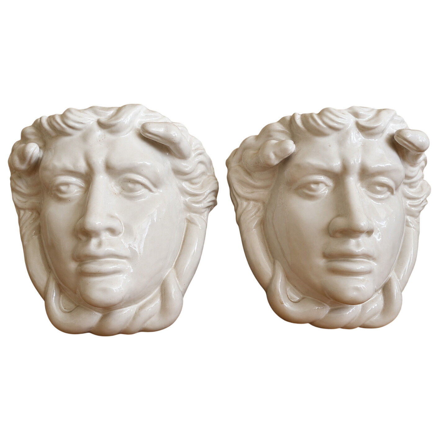 Pair of white glazed ceramic wall planters