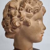 Bust of Bacchus child in patinated terracotta, 21 cm