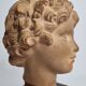 Bust of Bacchus child in patinated terracotta, 21 cm