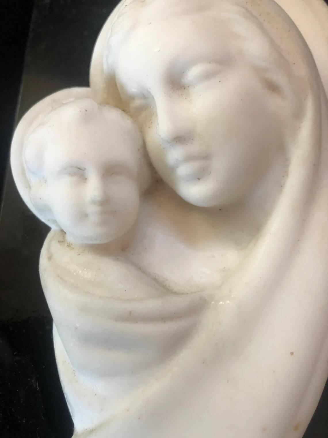 Virgin and Child bas relief in alabaster on black marble Inactive Photos