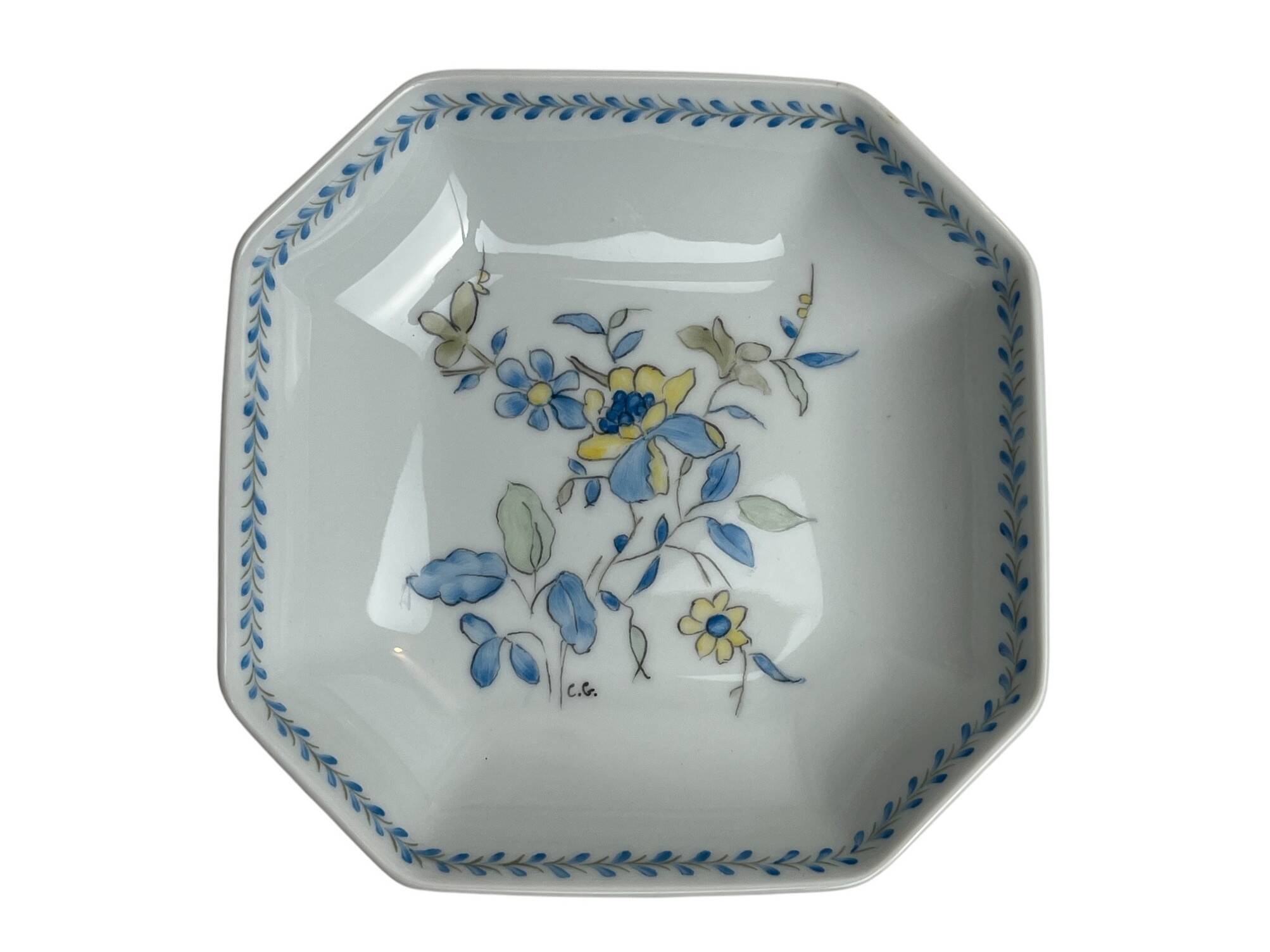 Octagonal empty pocket dish, hand-decorated earthenware, 20th century.