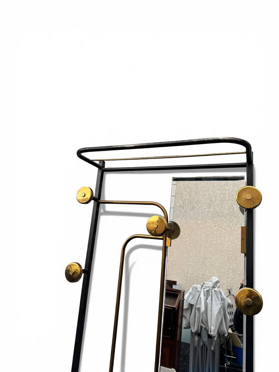 1960s modernist wardrobe. Gold lacquered metal.