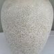 Cream speckled glazed vase with a gold rim, 1970s.
