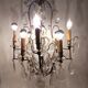 Neoclassical bronze chandelier with 8 lights, tassels and dagger