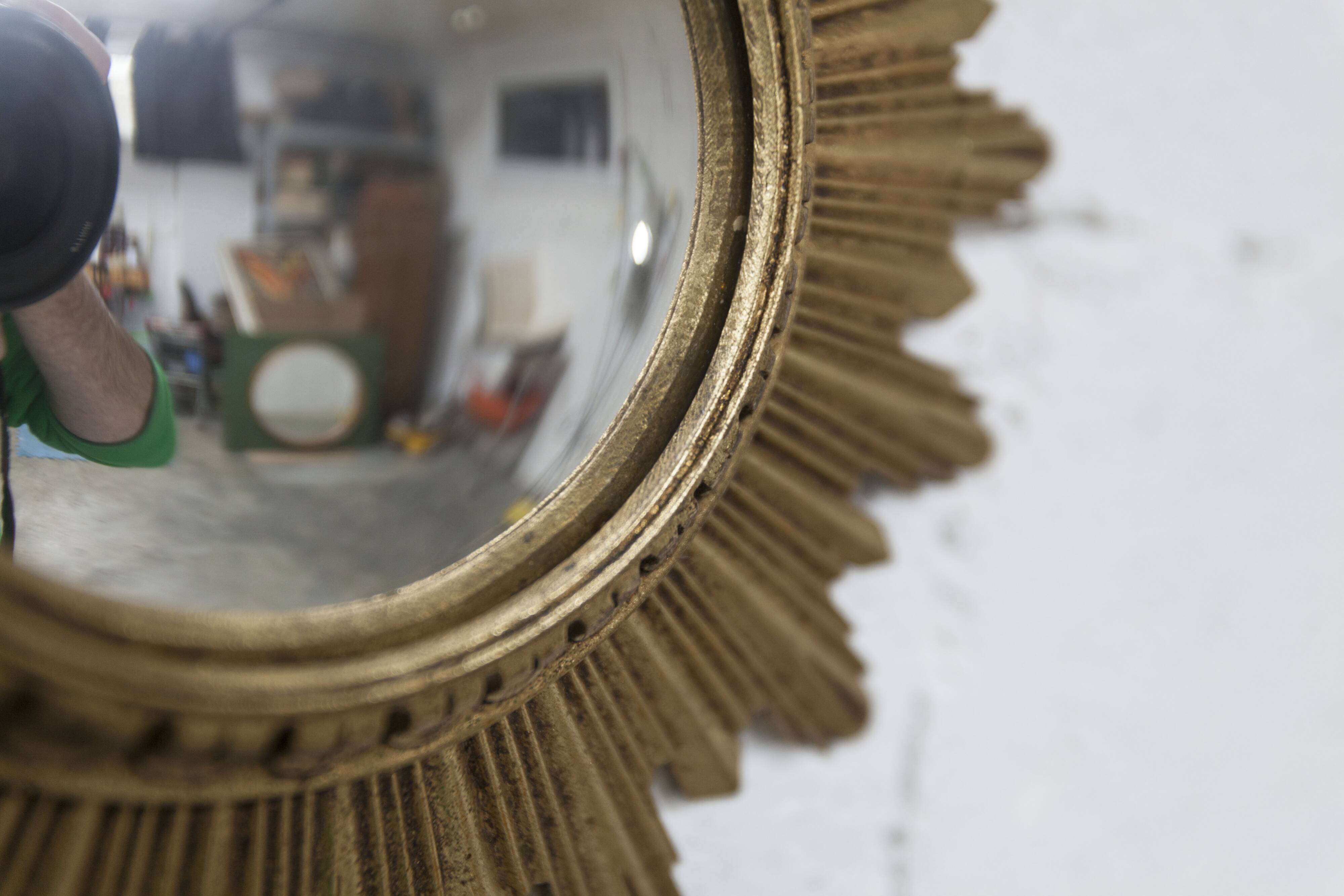 Vintage 1970s convex witch's eye sunburst mirror