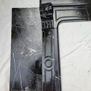 Pompadour fireplace with black marble modillions