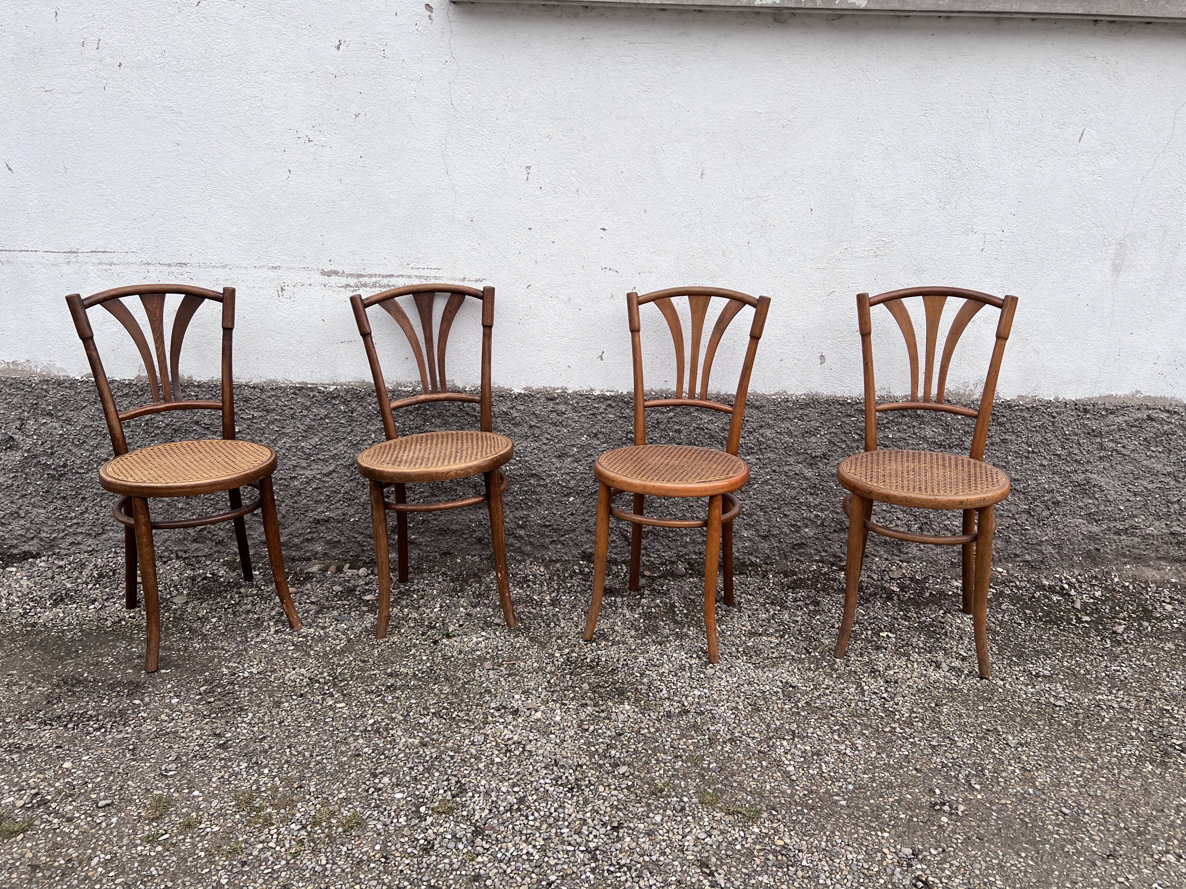 Series of 4 wooden chairs and cannage
