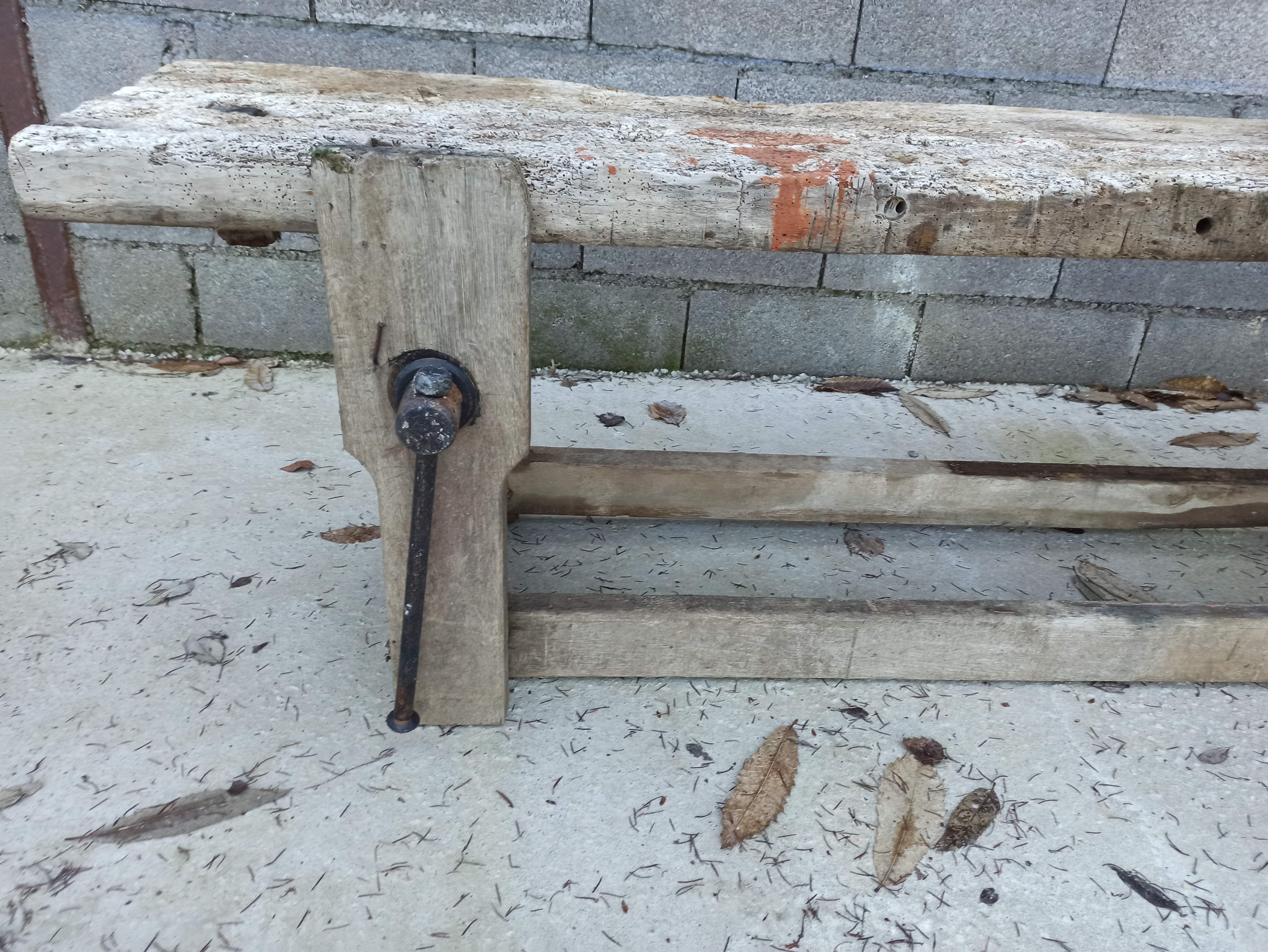 Wooden carpenter's workbench with iron and wooden vice