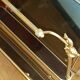 1950s bronze and tinted glass magazine rack with clawed feet