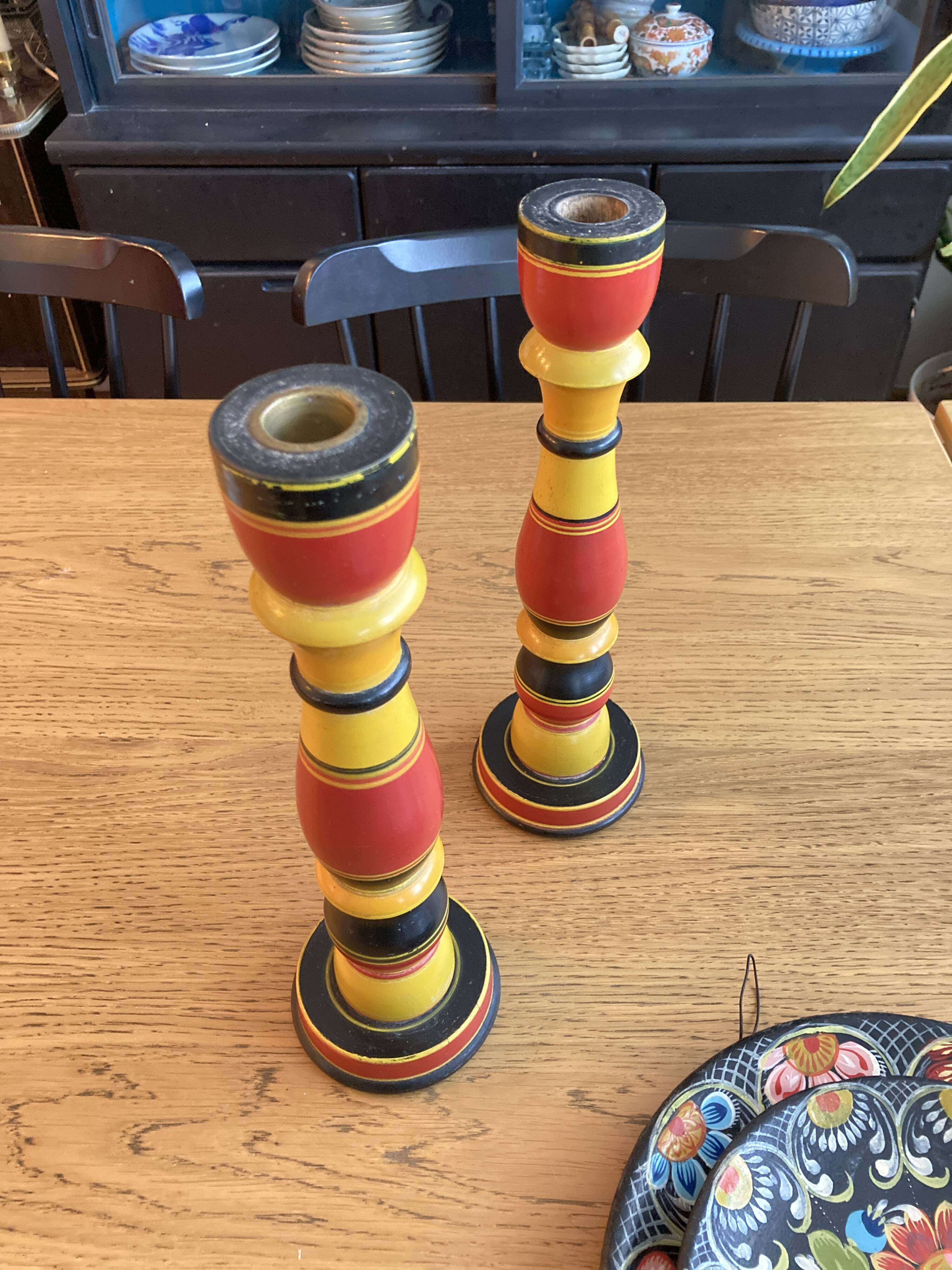 Polychrome turned wooden candlesticks