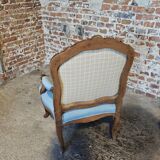 Louis XV style armchair in carved wood – blue fabric